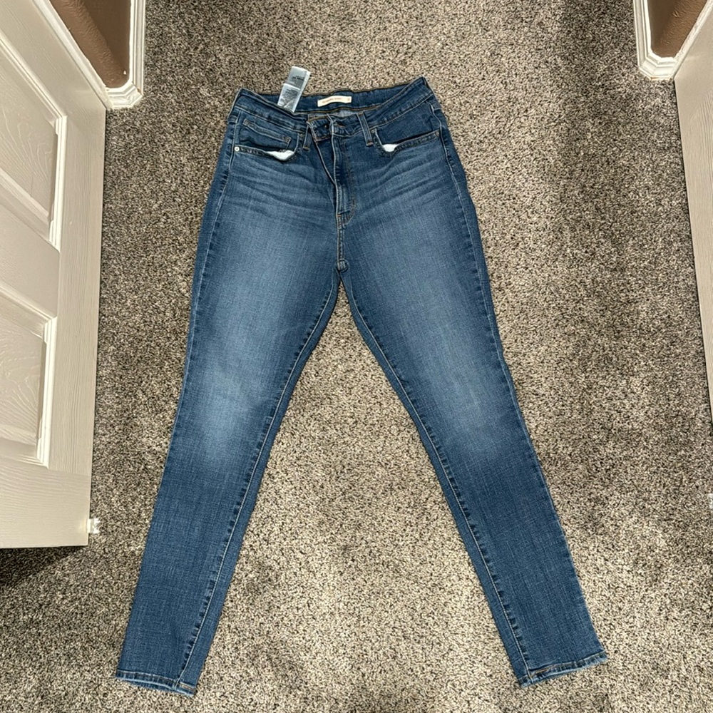 Levi’s high rise skinny.
